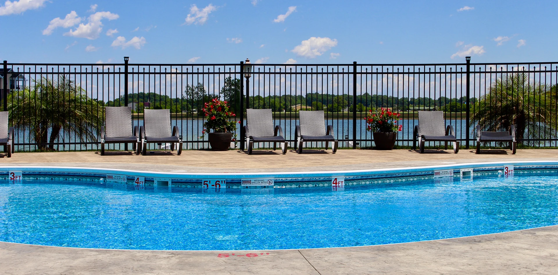 Pool fence with spear top pickets